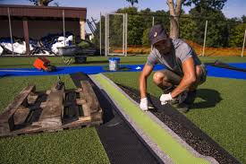 man working on lawn